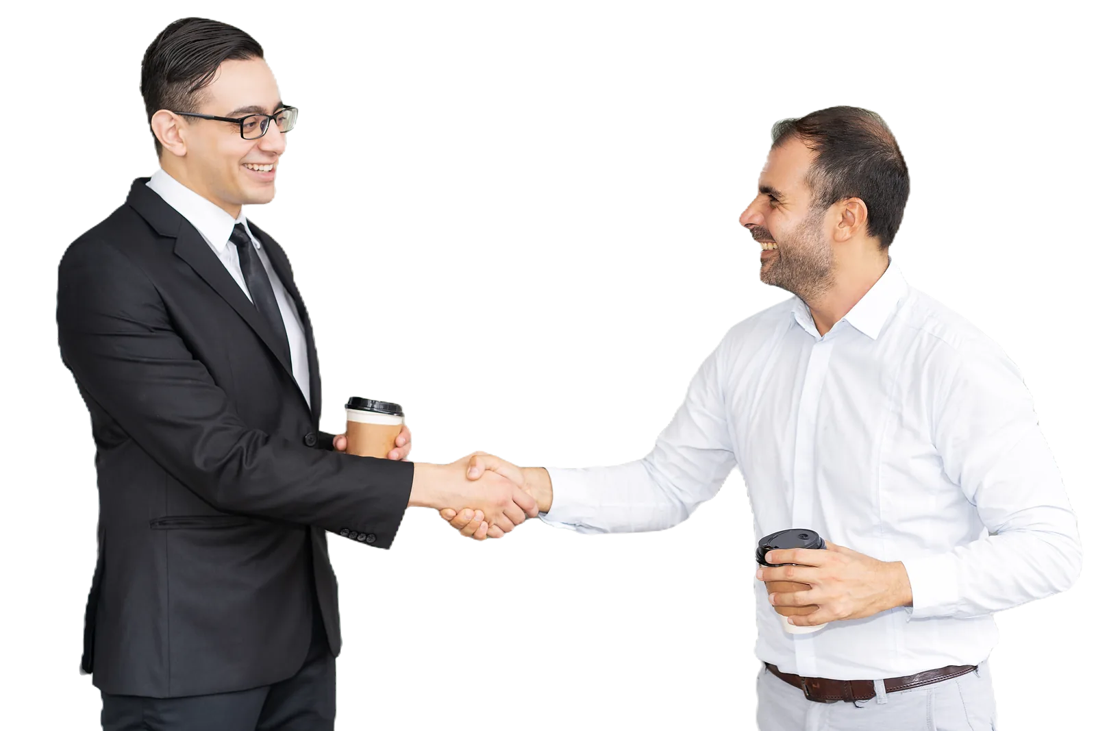 Two businessmen shake hands while holding coffee, demonstrating successful llnd training partnerships.