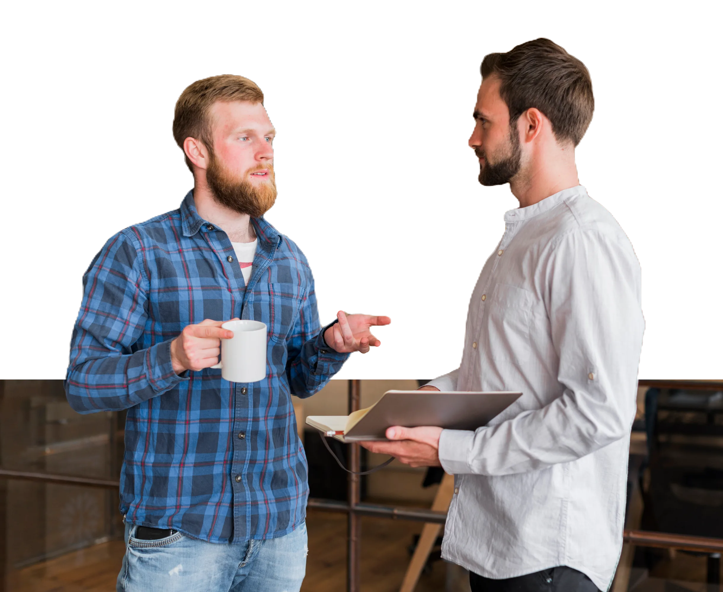 Two coworkers discuss LLND training while one holds a tablet and mug.