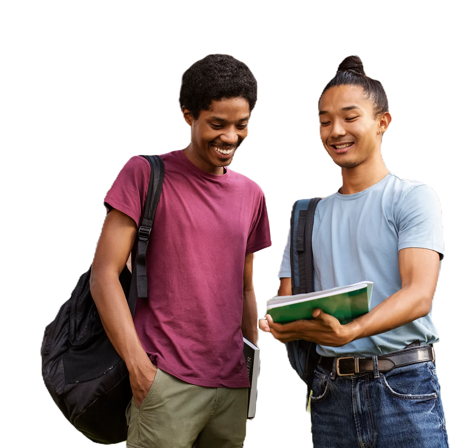 Two students share a laugh while reviewing notes, demonstrating the supportive learning environment of our advanced skills.
