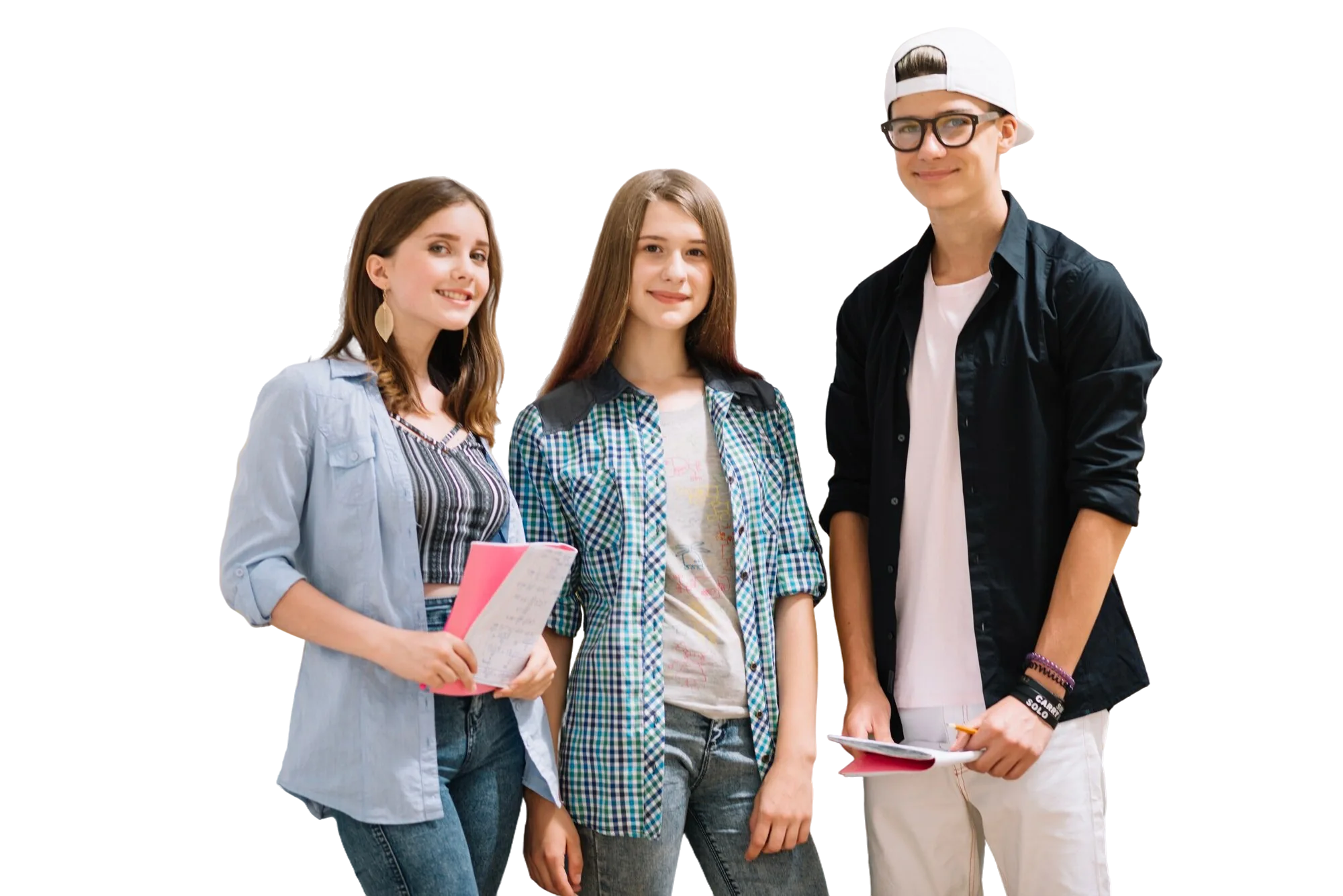 Three students stand together holding books and notebooks, demonstrating foundational skills training.